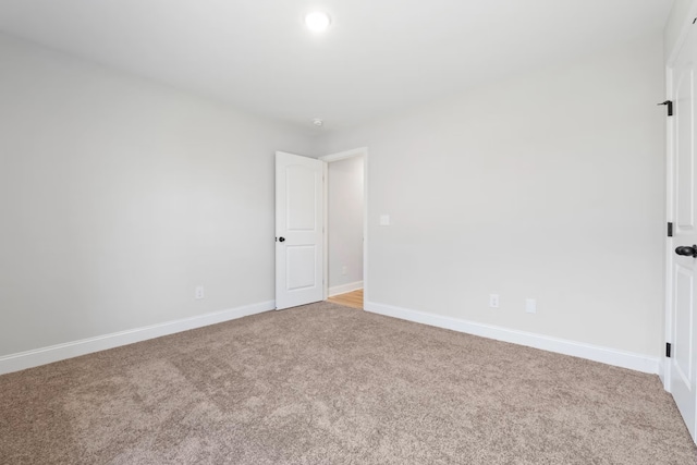 214 Briarwood Dr, Nevada, TX 75173 - spare room featuring baseboards and carpet floors