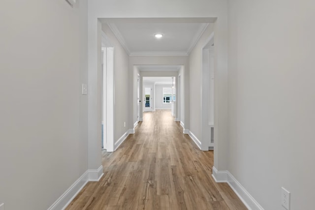 214 Briarwood Dr, Nevada, TX 75173 - hall featuring light wood finished floors, crown molding, and baseboards
