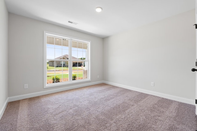 214 Briarwood Dr, Nevada, TX 75173 - carpeted spare room featuring visible vents and baseboards