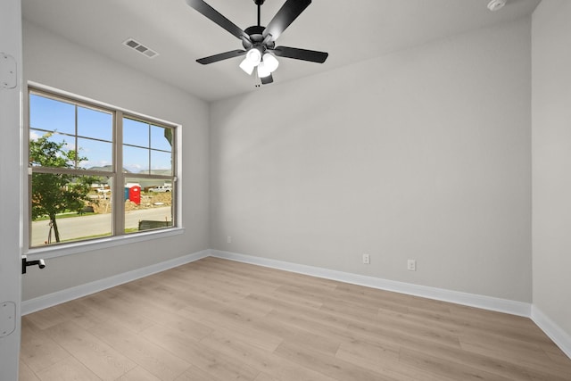 2012 Tolleson Dr, Fort Worth, TX 76008 - spare room with light wood-style floors and a ceiling fan