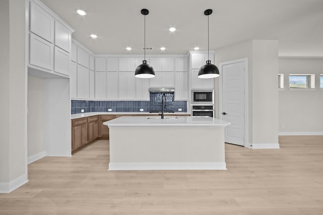 2012 Tolleson Dr, Fort Worth, TX 76008 - kitchen featuring oven, built in microwave, light countertops, decorative backsplash, and light wood-style floors