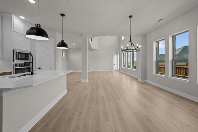 2012 Tolleson Dr, Fort Worth, TX 76008 - unfurnished dining area featuring light wood-style flooring, recessed lighting, and a chandelier
