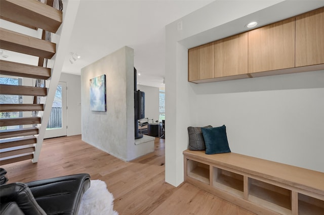 mudroom with recessed lighting and light wood-style floors
