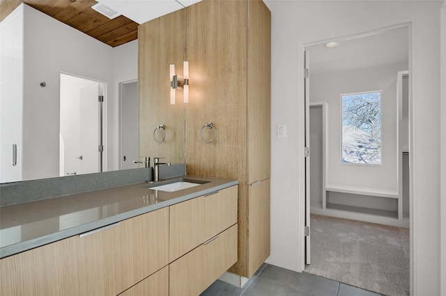 bathroom featuring visible vents, wood ceiling, vanity, and tile patterned flooring