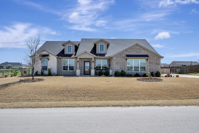 169 Oak Grove Dr, Rhome, TX 76078 - view of front of home featuring fence and brick siding