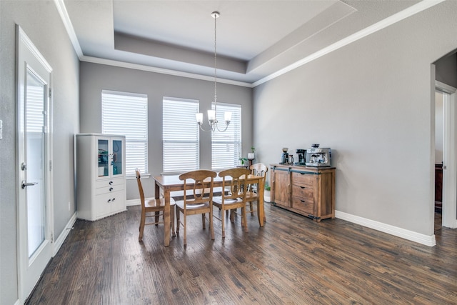 6565 Oak Point Cir, Royse City, TX 75189 - dining area with a raised ceiling, dark wood-style floors, a chandelier, baseboards, and ornamental molding