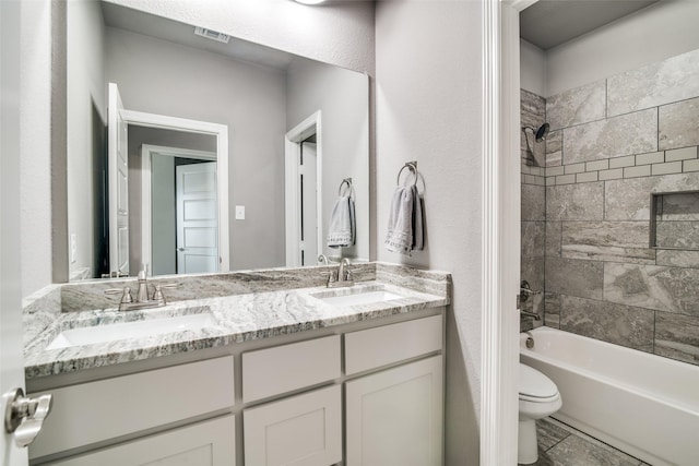 6565 Oak Point Cir, Royse City, TX 75189 - full bath with toilet, double vanity, and shower / tub combination