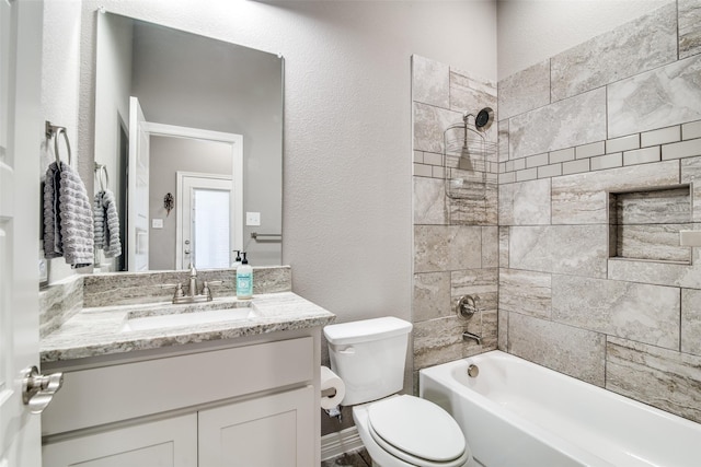 6565 Oak Point Cir, Royse City, TX 75189 - full bathroom with a textured wall, toilet, vanity, and  shower combination