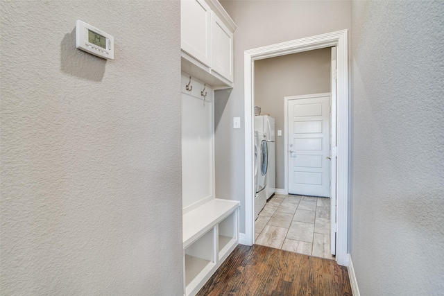 6565 Oak Point Cir, Royse City, TX 75189 - mudroom with light wood-type flooring, a textured wall, baseboards, and washer / dryer