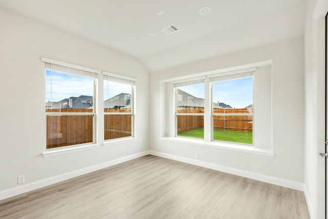 817 Lakewood Ct, Midlothian, TX 76065 - spare room with light wood-style flooring, baseboards, and vaulted ceiling