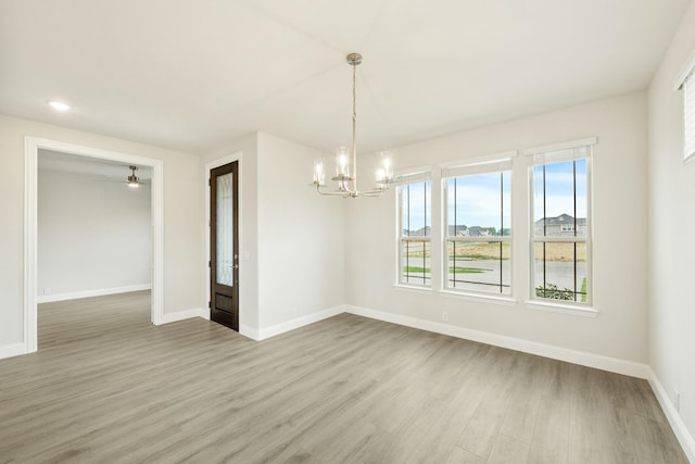 817 Lakewood Ct, Midlothian, TX 76065 - unfurnished dining area with a chandelier, wood finished floors, and baseboards
