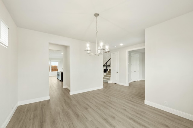 817 Lakewood Ct, Midlothian, TX 76065 - unfurnished dining area with a chandelier, stairway, light wood-style floors, recessed lighting, and baseboards