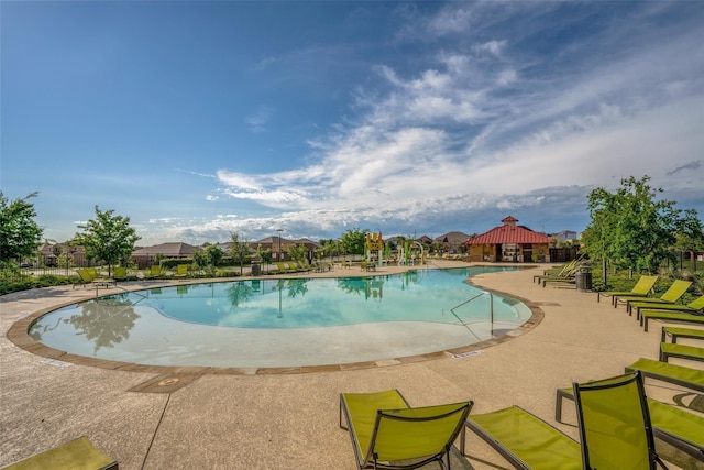 pool featuring a gazebo and a patio area