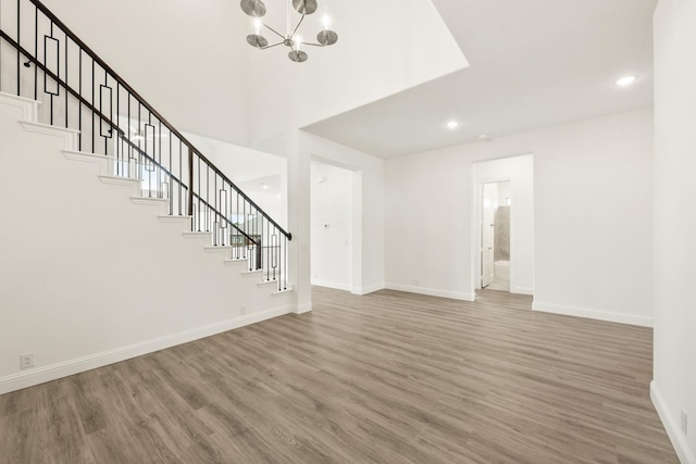 4217 Bel Air Dr, Midlothian, TX 76065 - unfurnished living room featuring stairs, wood finished floors, baseboards, a chandelier, and recessed lighting