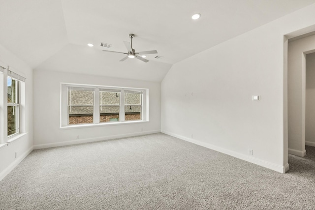 4217 Bel Air Dr, Midlothian, TX 76065 - carpeted spare room featuring vaulted ceiling, healthy amount of natural light, ceiling fan, baseboards, and recessed lighting