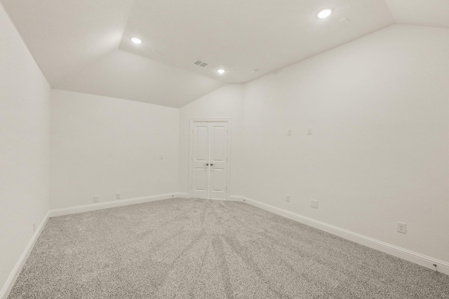 4217 Bel Air Dr, Midlothian, TX 76065 - spare room featuring vaulted ceiling, recessed lighting, light carpet, and baseboards
