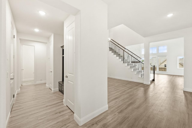 4217 Bel Air Dr, Midlothian, TX 76065 - hallway with stairs, light wood-type flooring, baseboards, and recessed lighting