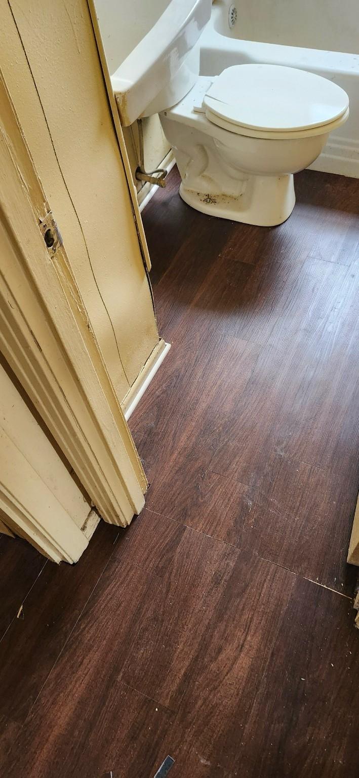 2716 Rosemont St, Shreveport, LA 71108 - bathroom with toilet and wood finished floors