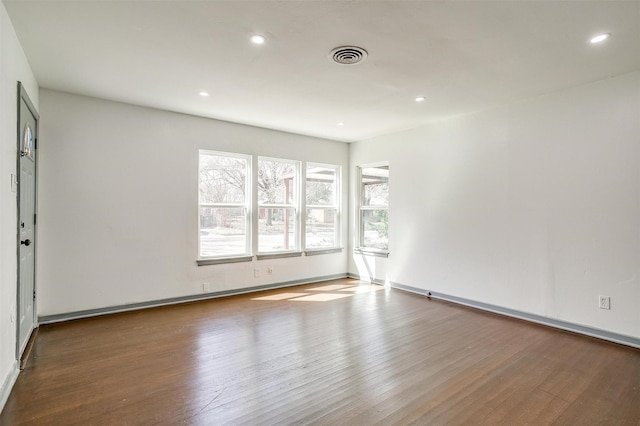 1036 Springer Ave, Fort Worth, TX 76114 - empty room with wood finished floors, recessed lighting, and baseboards