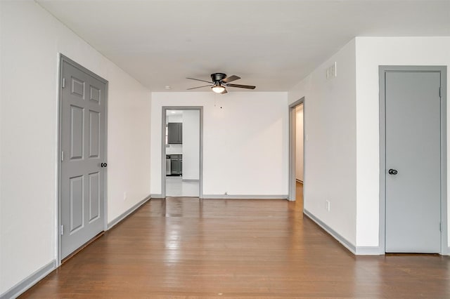 1036 Springer Ave, Fort Worth, TX 76114 - unfurnished room featuring a ceiling fan, wood finished floors, and baseboards