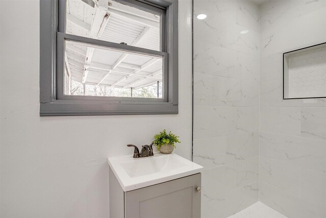1036 Springer Ave, Fort Worth, TX 76114 - bathroom with vanity and tiled shower