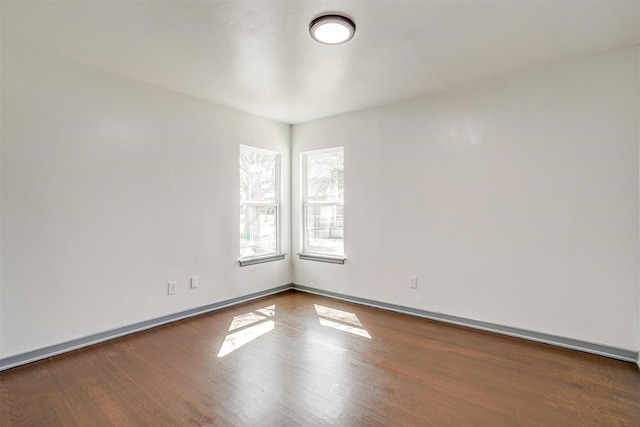 1036 Springer Ave, Fort Worth, TX 76114 - spare room featuring wood finished floors and baseboards