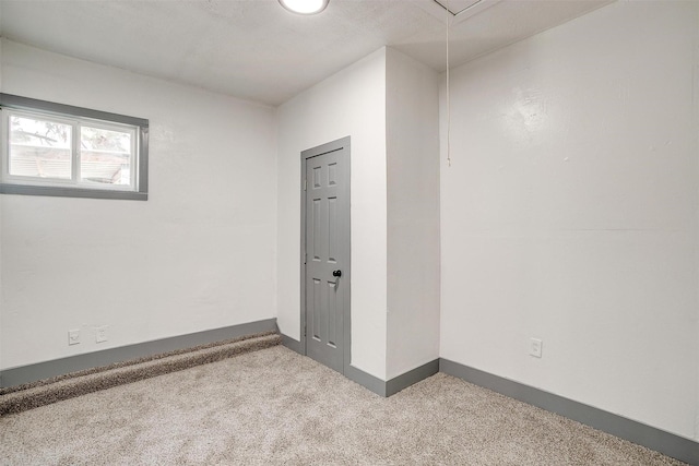 1036 Springer Ave, Fort Worth, TX 76114 - carpeted empty room featuring baseboards and attic access