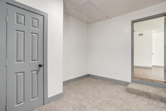 1036 Springer Ave, Fort Worth, TX 76114 - carpeted empty room with attic access and baseboards