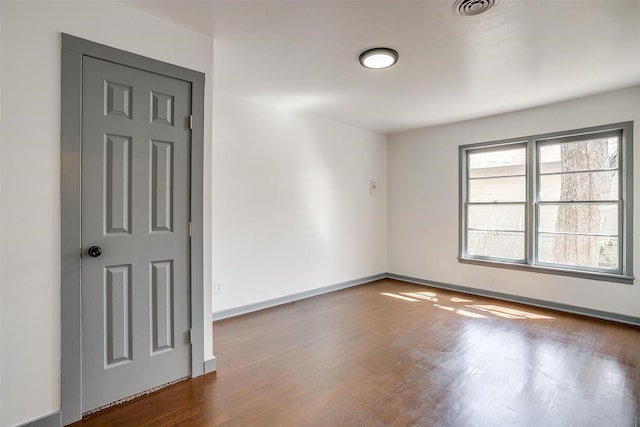 1036 Springer Ave, Fort Worth, TX 76114 - empty room featuring dark wood-style flooring and baseboards