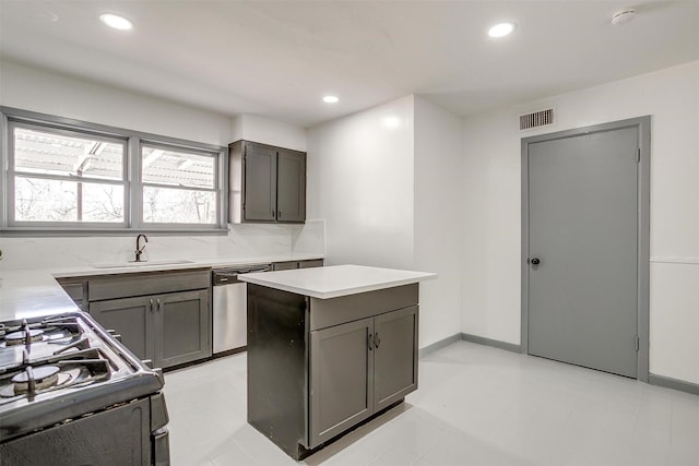 1036 Springer Ave, Fort Worth, TX 76114 - kitchen with dishwasher, a sink, gray cabinetry, light countertops, and tasteful backsplash