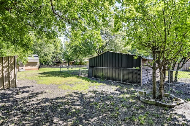 107 Carol Ln, Red Oak, TX 75154 - view of yard featuring an outbuilding