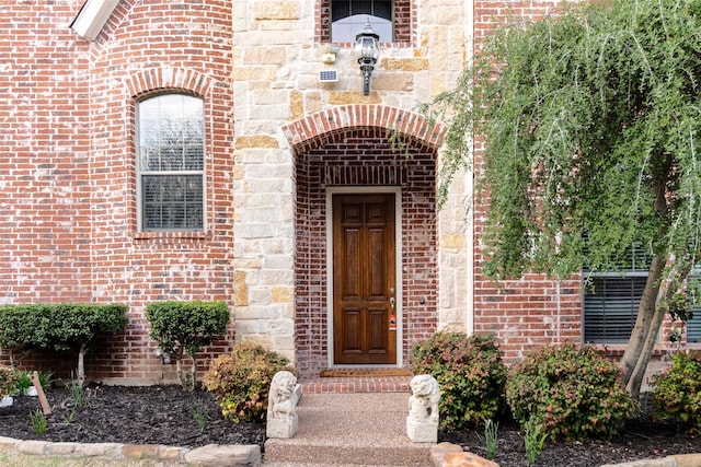 920 White River Dr, Allen, TX 75013 - doorway to property with brick siding