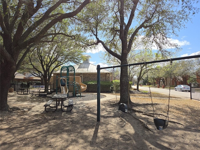 view of property's community with fence