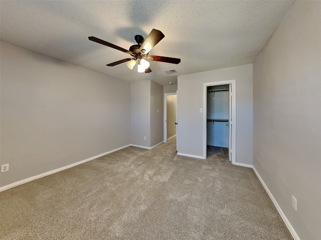 1114 Huntington Trl, Mansfield, TX 76063 - unfurnished bedroom featuring visible vents, a ceiling fan, a textured ceiling, carpet, and baseboards