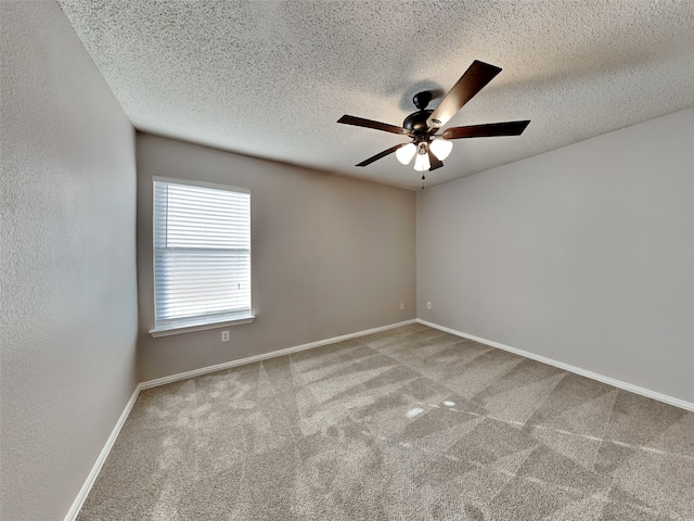 1114 Huntington Trl, Mansfield, TX 76063 - carpeted spare room featuring baseboards, a textured ceiling, a ceiling fan, and a textured wall