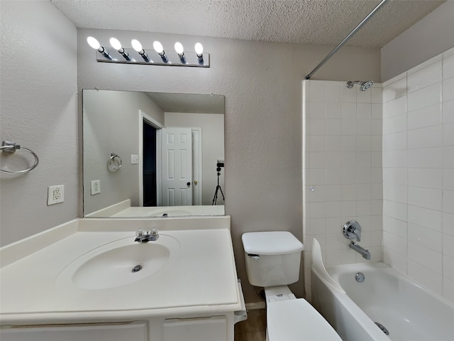 1114 Huntington Trl, Mansfield, TX 76063 - full bathroom featuring toilet, a textured ceiling, tub / shower combination, vanity, and a textured wall