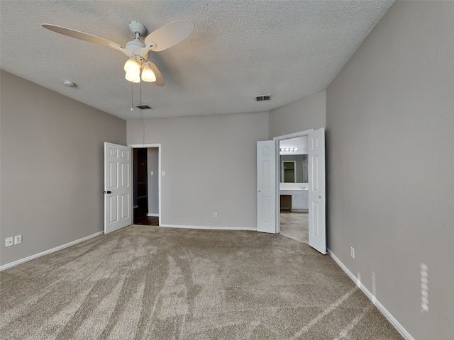 1114 Huntington Trl, Mansfield, TX 76063 - unfurnished room with a textured ceiling, baseboards, a ceiling fan, and carpet floors