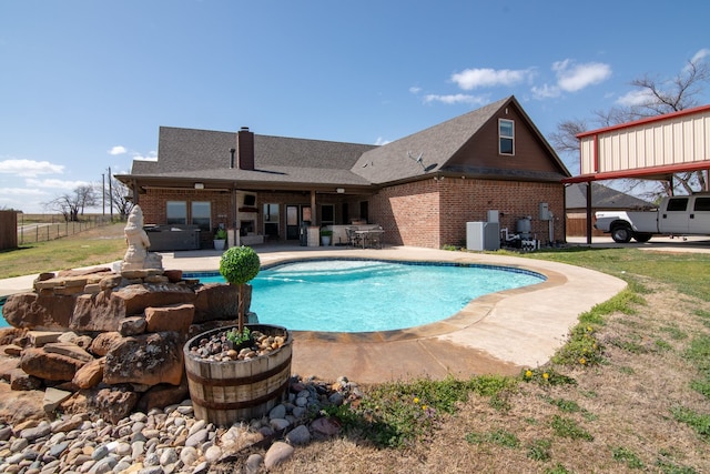 view of swimming pool with a fenced in pool, fence, a patio, and central air condition unit