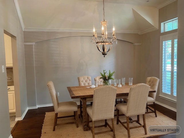 2449 Elm Leaf Ln, Plano, TX 75025 - dining area featuring a chandelier, wood finished floors, crown molding, baseboards, and a high ceiling