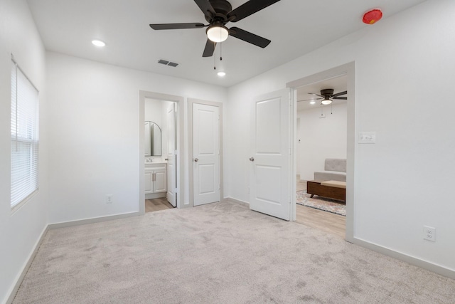 4726 Bartlett Ave, Dallas, TX 75216 - unfurnished bedroom featuring ensuite bathroom, carpet floors, baseboards, and recessed lighting
