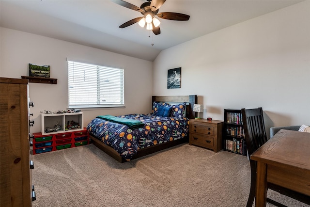 bedroom with vaulted ceiling, carpet, and ceiling fan