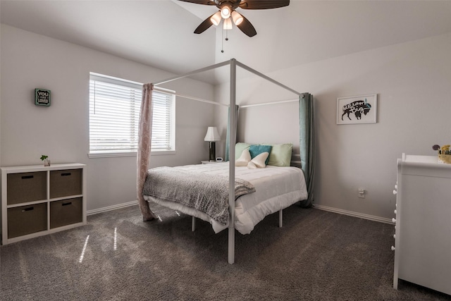 carpeted bedroom featuring baseboards and a ceiling fan