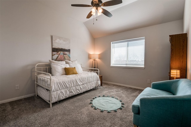 carpeted bedroom with lofted ceiling, a ceiling fan, and baseboards