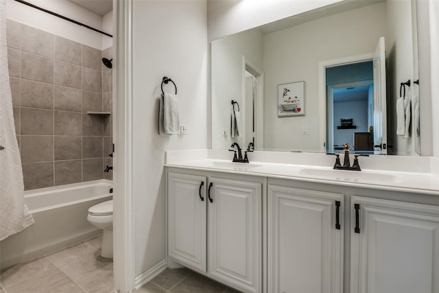 bathroom with shower / bath combo with shower curtain, a sink, double vanity, and toilet