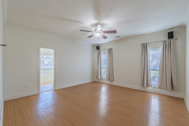 10471 Holly Creek Rd, Poetry, TX 75160 - empty room with visible vents, ceiling fan, baseboards, and light wood-style floors