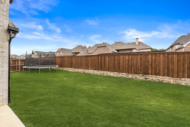 1733 Cousins Trl, Frisco, TX 75034 - view of yard with a trampoline and a residential view