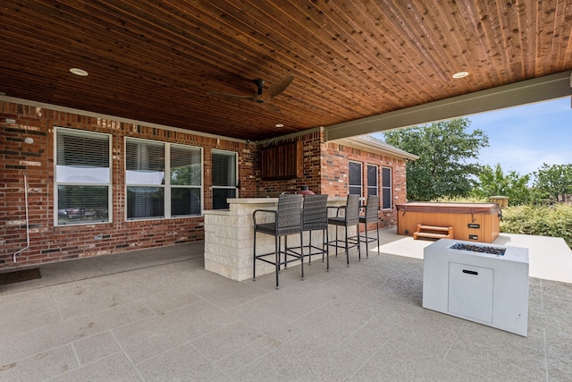 9601 Delmonico Dr, Fort Worth, TX 76244 - view of patio with a hot tub, an outdoor bar, and ceiling fan