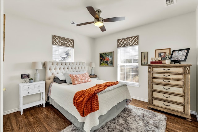 4933 County Road 340, Mckinney, TX 75071 - bedroom with baseboards, dark wood-style flooring, and visible vents