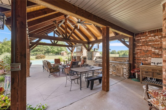4933 County Road 340, Mckinney, TX 75071 - view of patio / terrace with exterior kitchen, fence, outdoor dining area, a gazebo, and grilling area