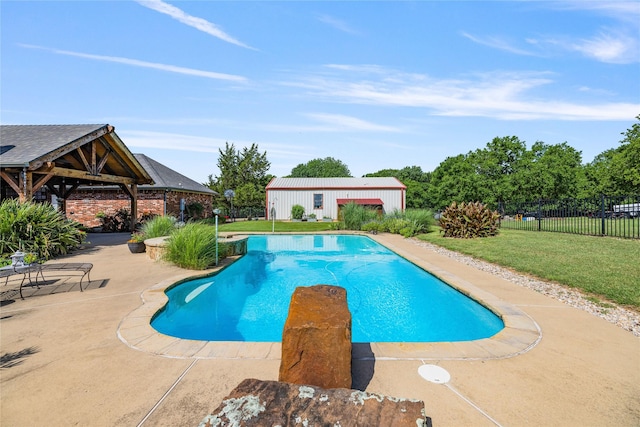 4933 County Road 340, Mckinney, TX 75071 - view of swimming pool with an outdoor structure, fence, a fenced in pool, a yard, and a patio area